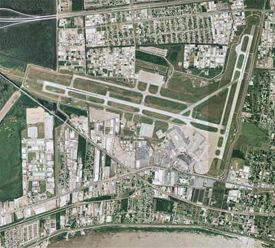 birds eye view of MSY, showing terminal buildings and runways