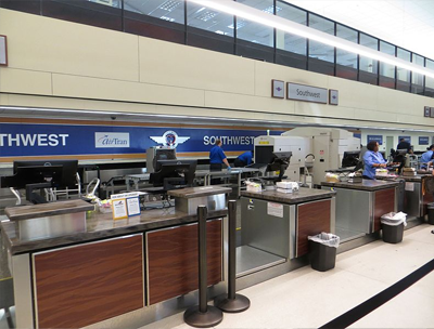 inside MSY airport, showing southwest check-in desks