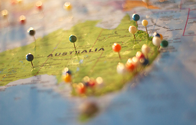 A map of Australia with pins in different spots to indicate an Australian travel plan