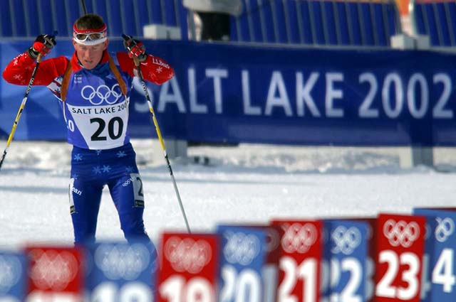 Winter Olympian participating in cross country ski event 