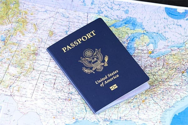 Passport with flight ticket inside